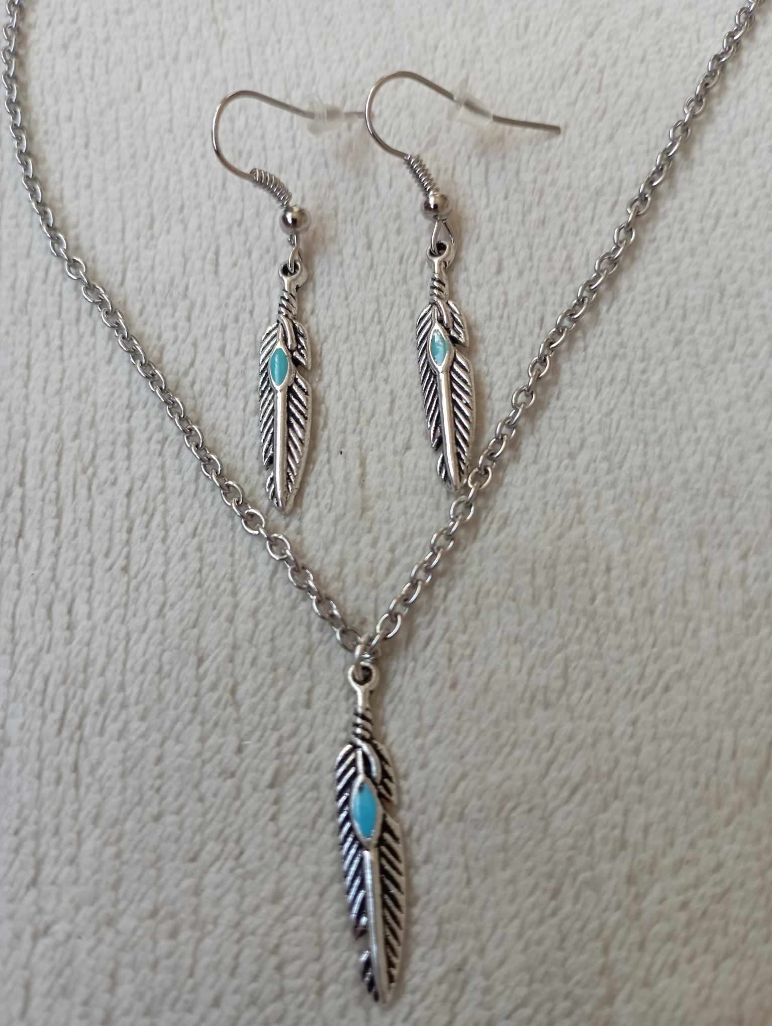 Parure plumes turquoise - Les créations d'asuna