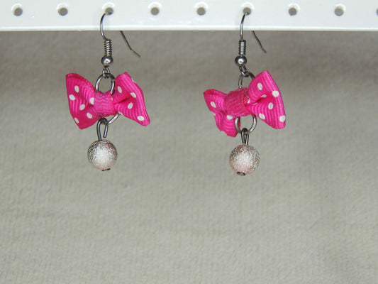 Boucles d'oreilles noeud rose et perle